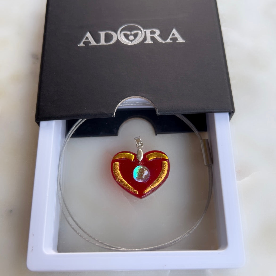 Heart Pendant with see green center over Venetian Red glass, and gold
